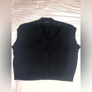 black sweater vest